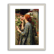 A framed art print featuring a classical painting of a woman with red hair smelling pink roses, set against a opaque white frame and no matt.