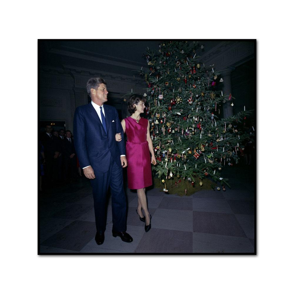 President and Mrs. Kennedy at the White House Staff Christmas Party